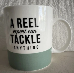 A Reel expert can tackle anything - Cup/Mug - Bell & Curfew Ltd. - Fishin’ Stuff - Picture 1 of 4