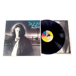 Umberto Tozzi Invisibile LP ITALY 1987 - Foto 1 di 1