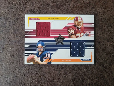 2005 Leaf Rookies & Stars Dual Jersey /500 Kyle Orton Carlos Rogers Rookie RC - Image 1 of 4