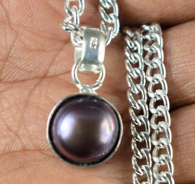 Colgante redondo natural de Tahití negro del Mar del Sur de 9,45 quilates para hombre ver video Foto 1 de 4