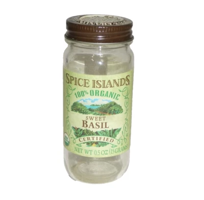 Tarro de especias vacío de albahaca dulce orgánica Spice Islands de colección con etiqueta de papel verde Foto 1 de 2
