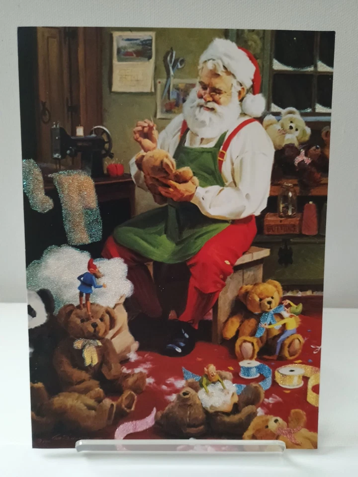 Tarjeta de felicitación de Navidad Santa Claus en taller para hacer osos de peluche juguetes navideños  Foto 1 de 4