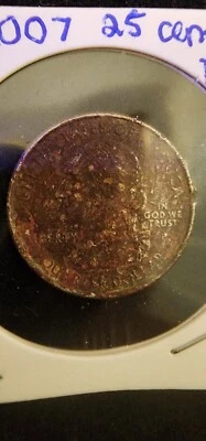 2007 25 cent ID state quarter with miss clad & strike error - Image 1 of 4