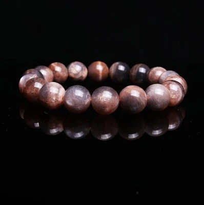 Pulsera de cuentas de cristal de luz fuerte de piedra solar de piedra lunar negra natural de 11.5mm 0995 Foto 1 de 4