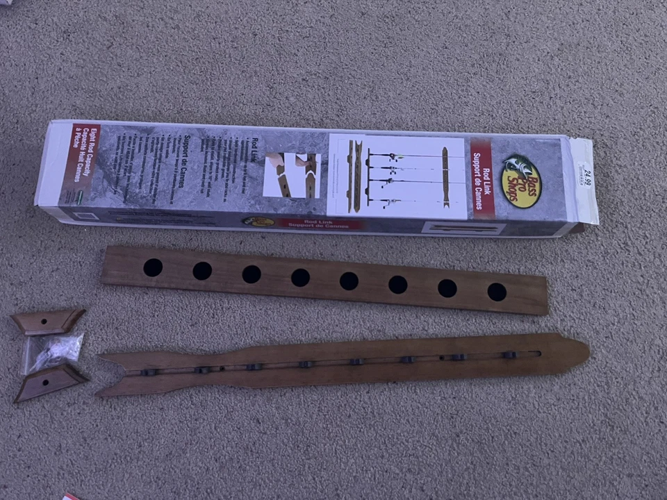 Bass Pro Shop eight rod capacity;wall rack for fishing poles - Imagem 1 de 4