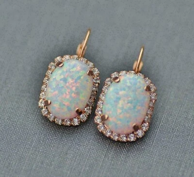 Pendientes colgantes ovalados de ópalo de fuego simulado de 2 quilates para mujer enchapados en oro rosa de 14 quilates Foto 1 de 3