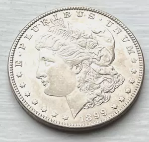 1899 P Morgan Silber Dollar 1 $ Stempelglanz BU besseres Datum 90% Silber - Bild 1 von 2