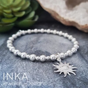 925 Sterling Silber Perlen Stapelarmband mit großem SONNEN Anhänger von INKA - Bild 1 von 7