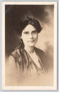 Postcard RPPC Bespectacled Young Woman Studio Portrait Glasses - Picture 1 of 3