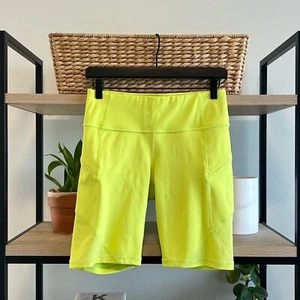 Pantaloncini da bici Athleta Contender 9" Mid-Rise con tasche con cerniera, piccoli - Foto 1 di 12