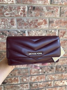 MICHAEL KORS JET SET VIAJE GRANDE TRIPLE CARTERA ACOLCHADA SANGRE DE BUEY - Imagen 1 de 6