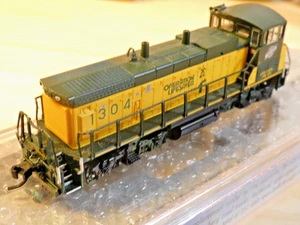 N scale locomotive ATLAS MP15 Road Switcher CNW Rd#1304 - Picture 1 of 9