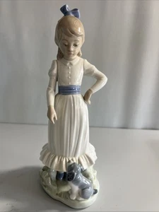 LLADRO NAO #0379 "Il mio cane fa trucchi" - Foto 1 di 7