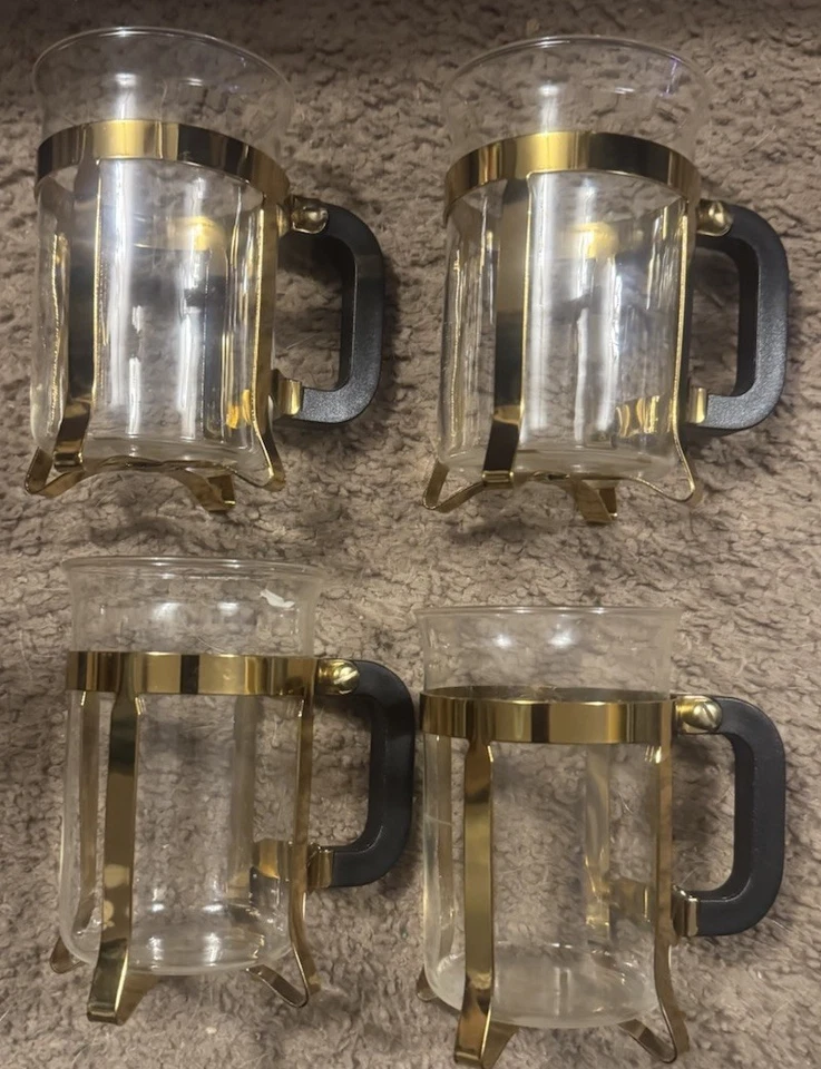 Tazas de vidrio Pyrex prensa francesa vintage con soportes de color dorado y mango negro Foto 1 de 1