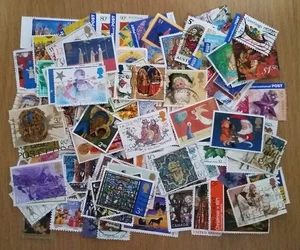 100 all different used world Christmas themed commemorative postage stamps - Picture 1 of 1