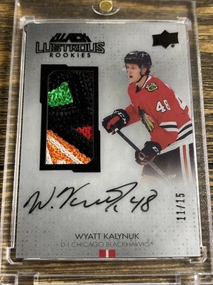 2021-22 UD Black Lustrous Rookies /15 Wyatt Kalynuk Auto Blackhawks RPA Patch - Image 1 of 2