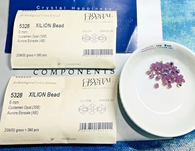Swarovski 5328 6 mm Cyclamen Opal AB paquete de sellos 360 piezas cuentas bicónicas austriacas raras Foto 1 de 3