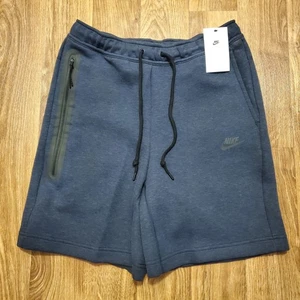 Nike Tech Fleece Shorts Men Medium Blue Standard Fit Above Knee Pockets New - Picture 1 of 8