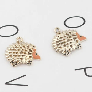 5 x Bright Gold Plated Hedgehog Charm Pendants with Orange Enamel Nose Detail - Picture 1 of 3