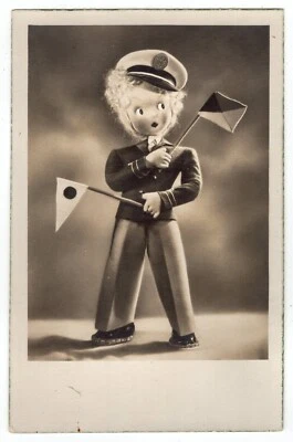 AK Puppen / "Matrose mit Signalflaggen" - Bild 1 von 2