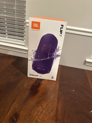 ALTAVOZ PORTÁTIL BLUETOOTH PÚRPURA JBL BY HARMAN FLIP 7 (JBLFLIP7PURAM) NUEVO Foto 1 de 4