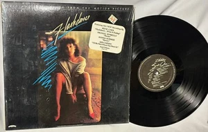 LP SOUNDTRACK Flashdance (ORIGINAL Vinyl w/Shrink/Hype Stkr, NBLP-7278 1983) NM - Imagen 1 de 4