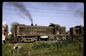 (A) ORIG TRAIN SLIDE-SPOKANE PORTLAND & SEATTLE (SP&S) IN TRAIN ON MONON - Picture 1 of 1