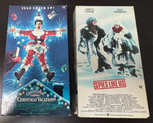 Spies Like Us (VHS, 1985)   and  Christmas Vacation (VHS 1990)  Chevy Chase - Picture 1 of 3
