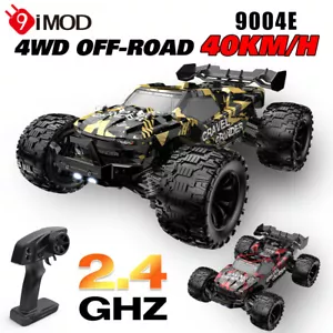 9004E RC Auto 1/14 2.4G 4WD 40KM/H Spazzolato Fuoristrada Auto per Roccia Sabbia Erba Strada - Foto 1 di 17