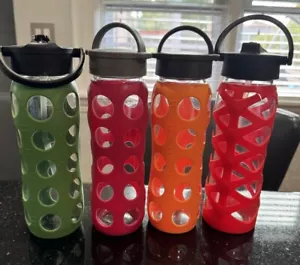 Lot Of 4 Lifefactory 22 oz Glass Water Bottles with Silicone Sleves EUC - Picture 1 of 5