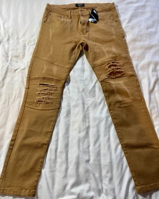 Jeans desgastados caqui para hombre Foto 1 de 4