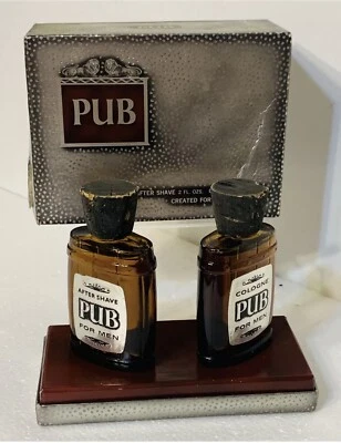 DE COLECCIÓN REVLON PUB COLONIA 2 OZ Y DESPUÉS DEL AFEITADO 2 OZ SALPICADURAS CON CAJA Foto 1 de 4