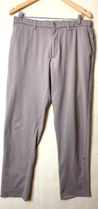 Uniqlo women's Khaki Pants Tan Ankle Crop Large Stretch Beige Button Snap Size L - Picture 1 of 11