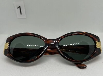 Gafas de sol Polaroid ovaladas con caparazón de tortuga estilo vintage detalles dorados templo retro Foto 1 de 4