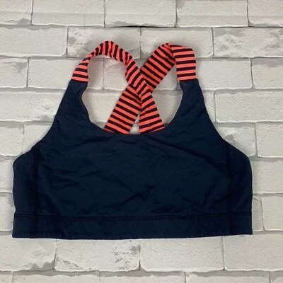 Sujetador deportivo entrecruzado Lululemon. Raya. Azul marino y coral. Talla M/S. Forrado Foto 1 de 4