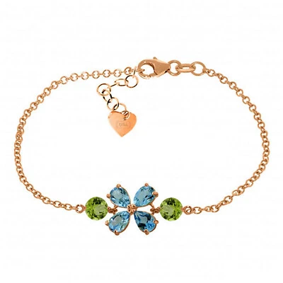 14K. PULSERA ORO MACIZO CON TOPACIO AZUL Y PERIDOTOS Foto 1 de 4