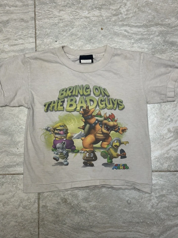 VINTAGE KIDS NINTENDO "BRING ON THE BAD GUYS" MARIO GRAPHIC T-SHIRT Medium - Image 1 of 4