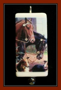 HORSES AND DOGS PENDANT WITH CORD AND BOX - Picture 1 of 2