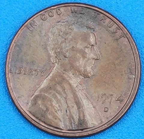 1974 D penny Off Center Strike Cover