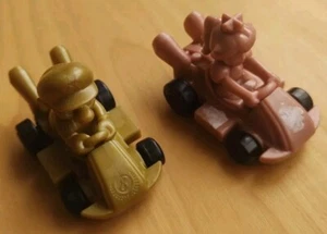Lot de 2 jouets McDonald’s Mario Kart 2024 Nintendo : Mario doré et princesse rose - Photo 1/9