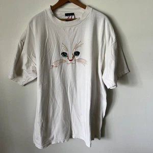 Camiseta Vintage Zena Jeans Años 90 Bordada Cara de Gato Ojos Cuello Redondo EE. UU. Gatito XL - Imagen 1 de 4
