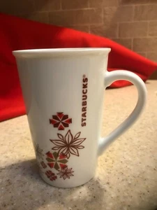 Starbucks 12 oz. Taza blanca con copos de nieve rojos de 4 1/2" de alto, excelente estado - Imagen 1 de 5