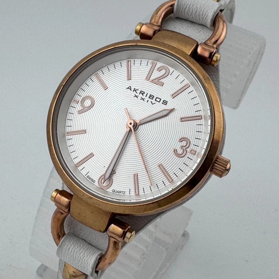 Reloj de cuarzo suizo Akribos para mujer oro rosa recubierto de zafiro correa batería nueva Foto 1 de 4