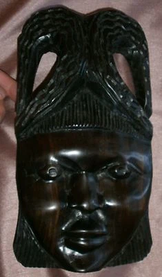 Visage artisanal d' Afrique ou d'Asie sculpté en bois d' ébène - Photo 1/4