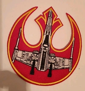 FUERZAS REBELDES - PARCHE ALA X Hierro para coser  - Imagen 1 de 3