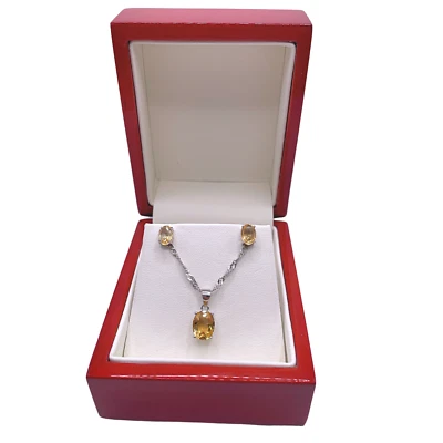 White gold finish 4 Claw Oval Cut Citrine Necklace And Earrings Set - Image 1 of 4