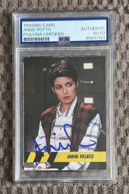 2016 Охотники за привидениями Джанин Мельниц C7 с автографом Энни Поттс PSA DNA Cryptozoic - Изображение 1 из 2