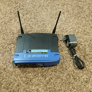 Linksys WRT54GL v1.1 router wireless G2,4 GHz router a banda larga switch 4 porte - Foto 1 di 7