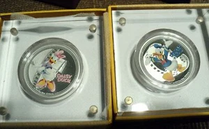 DISNEY DONALD & DAISY DUCK COINS 2014 PROOF 1 OZ SILVER EACH , NIUE MINT IN BOX - Picture 1 of 6