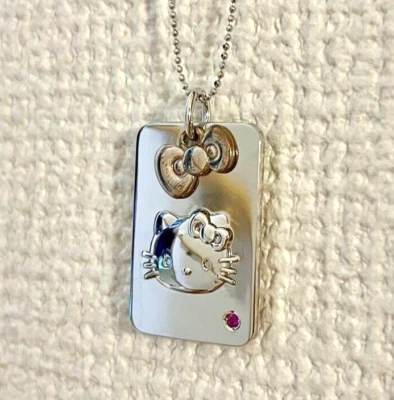 Ciondolo usato Hello Kitty usato Ag925 30° anniversario rubino "19 - Immagine 1 di 3